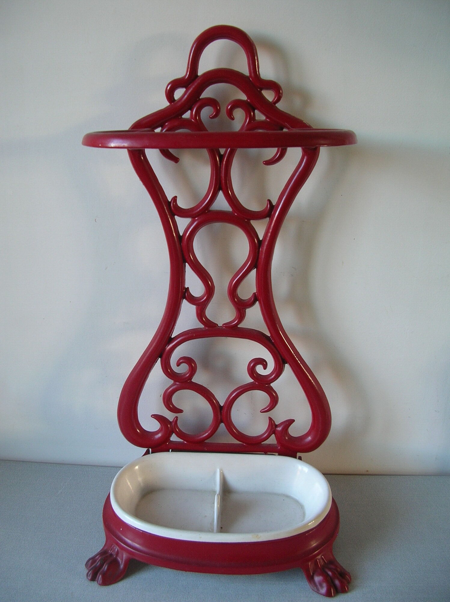 Old umbrella holder cane lion's paw in red and white enamelled cast iron