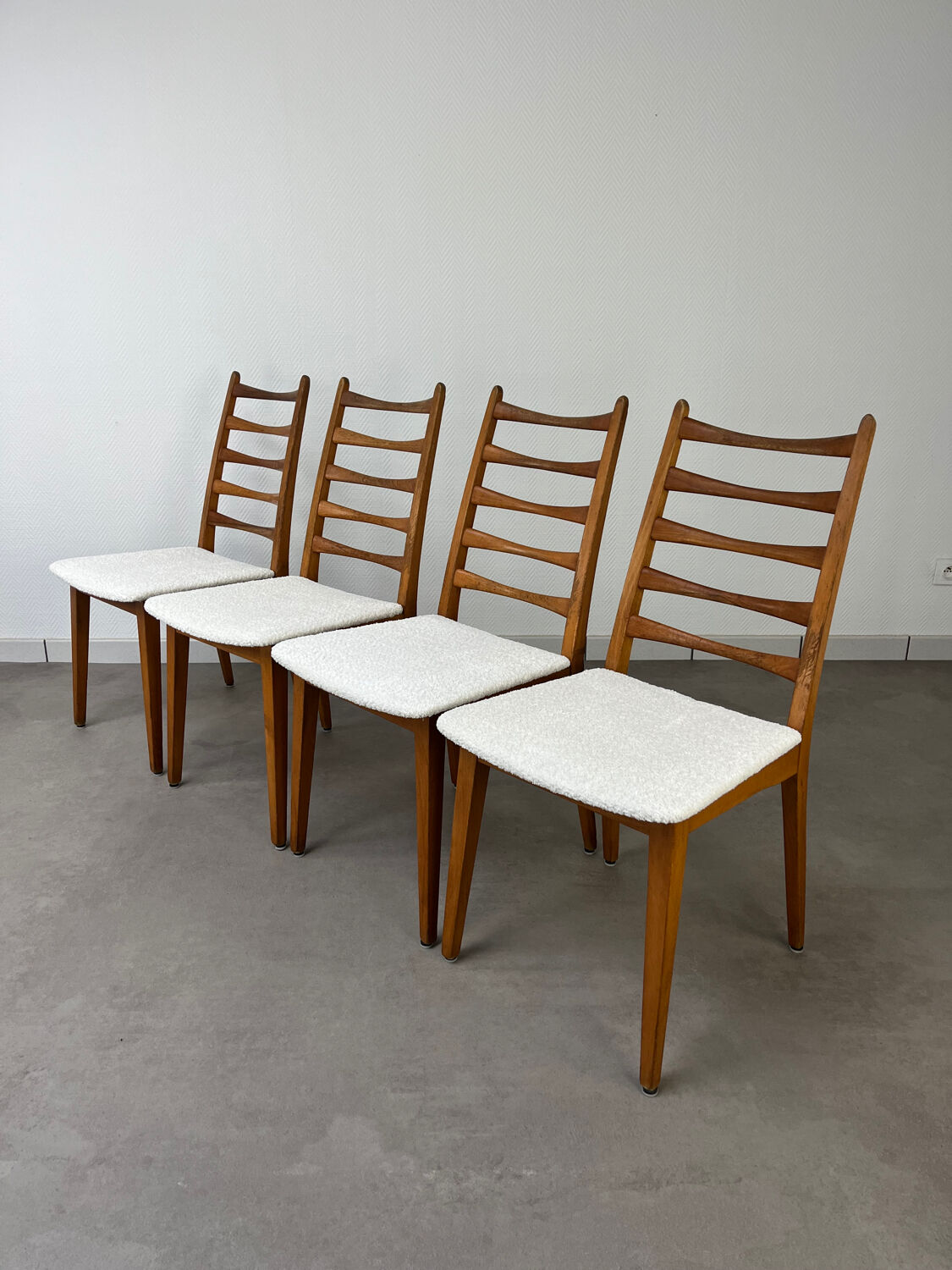 4 Scandinavian chairs, teak with boucle seats.