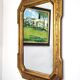 Miroir mural octogonal italien vintage en bois doré, décor bulliné