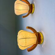 Pair of pear-shaped "Cocoon" wall sconces, resin and pine wood, Italy, 1970s