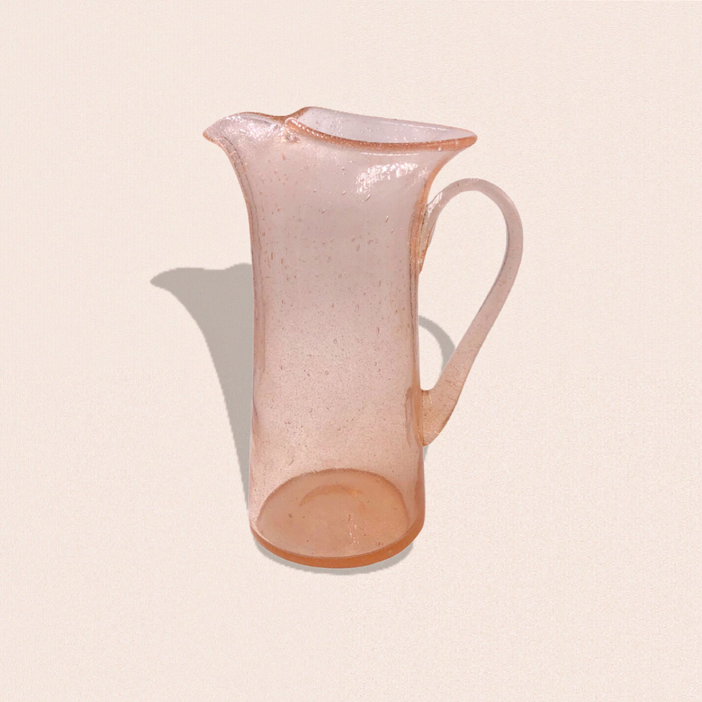 Artisanal pitcher in bulled glass