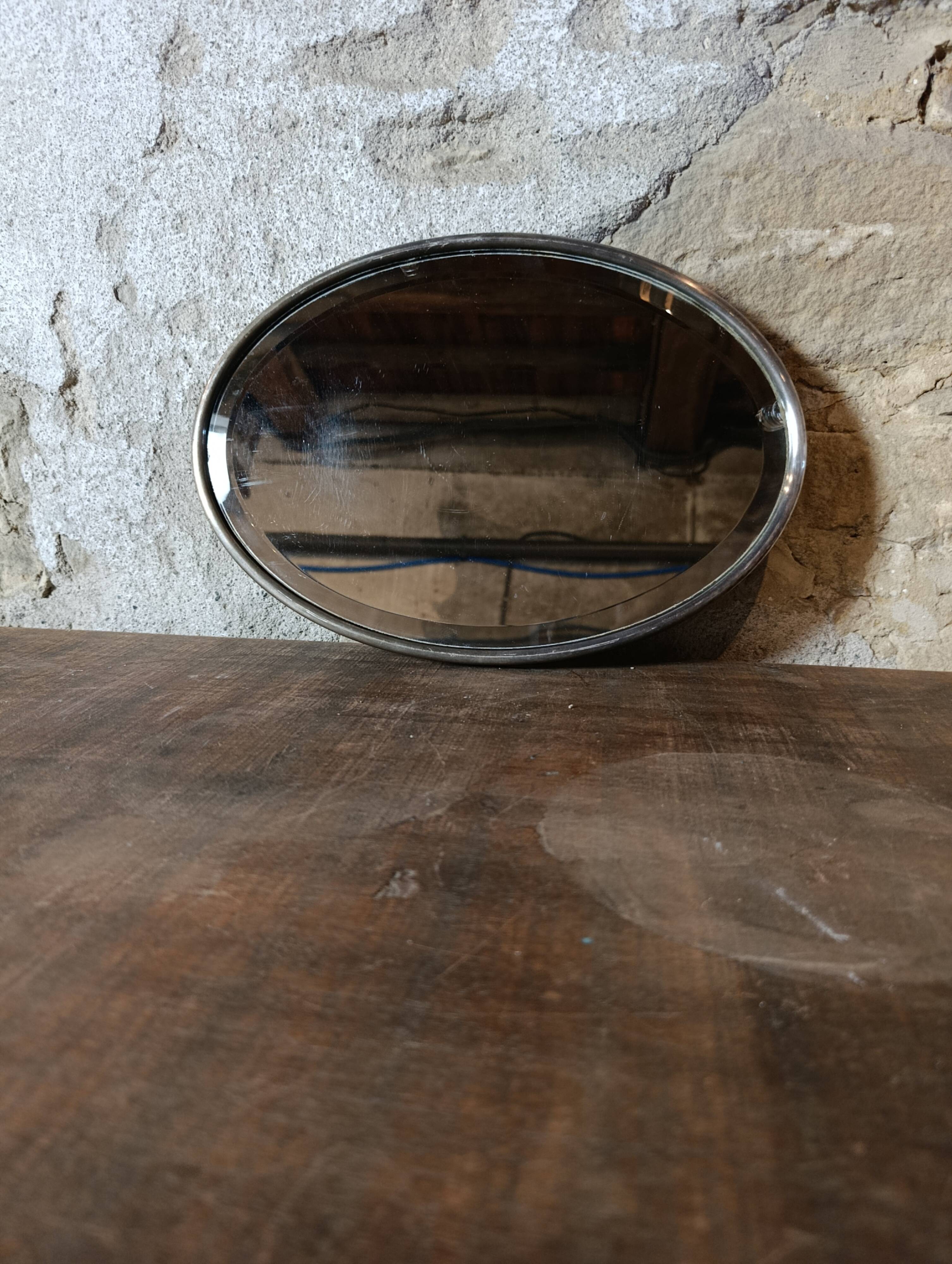 French vintage oval mirror with beveled glass and metal frame