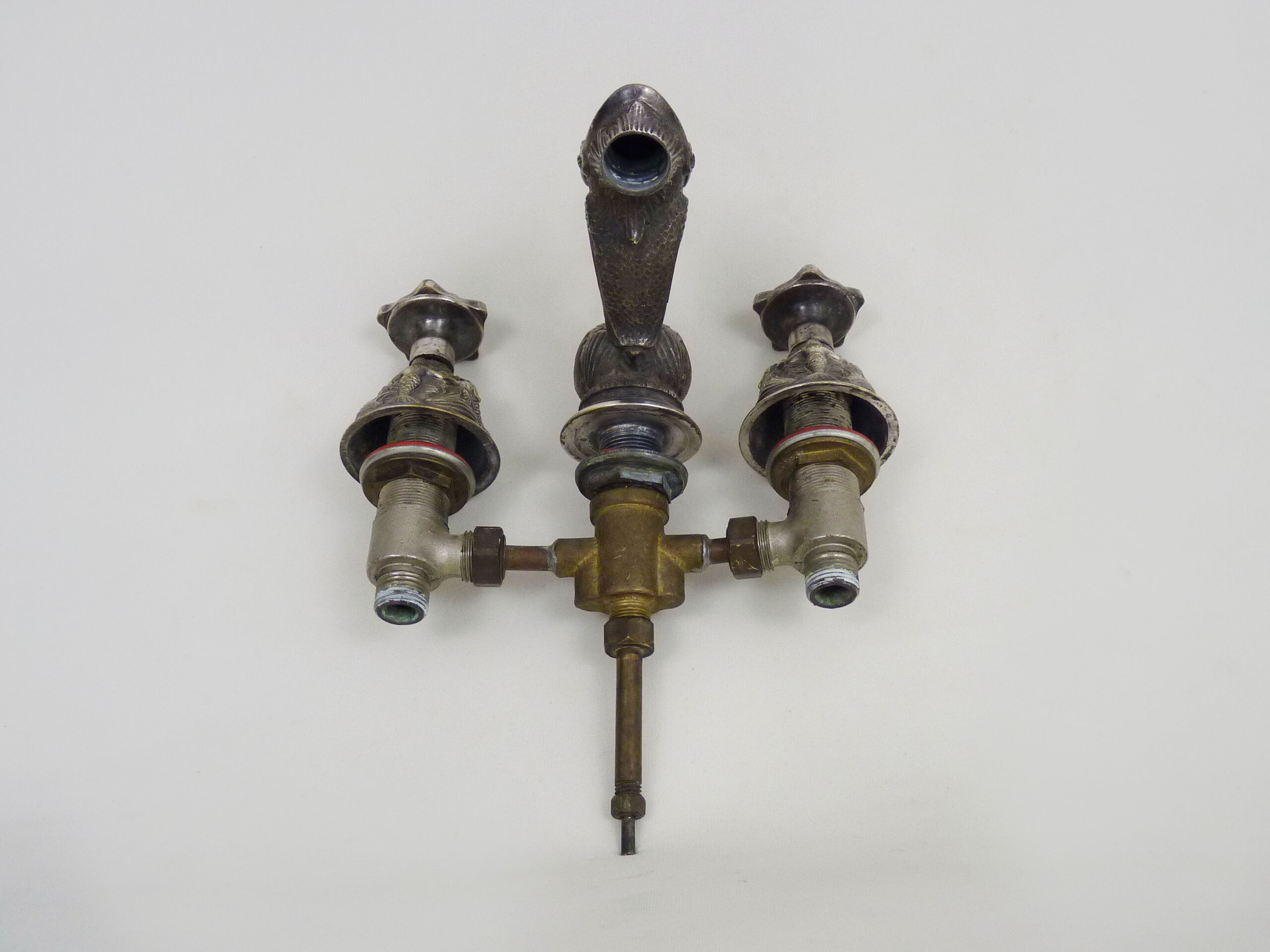 Old bathtub faucet, silver bronze kitchen with dolphin head and mermaid