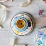 2 hand painted candle holders