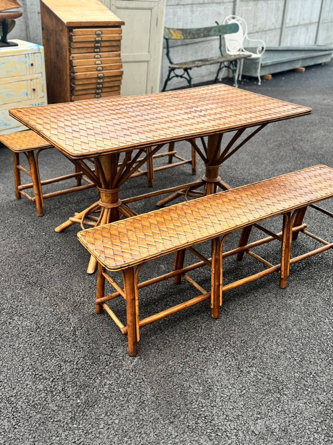 Vintage 1950s set: large table with tripod base and benches in woven chestnut