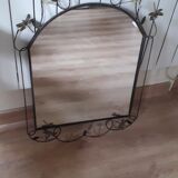 Mirror of shape with flower and dragonfly patterns