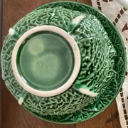Large soup tureen in earthenware with a cabbage design, along with a dish and spoon.