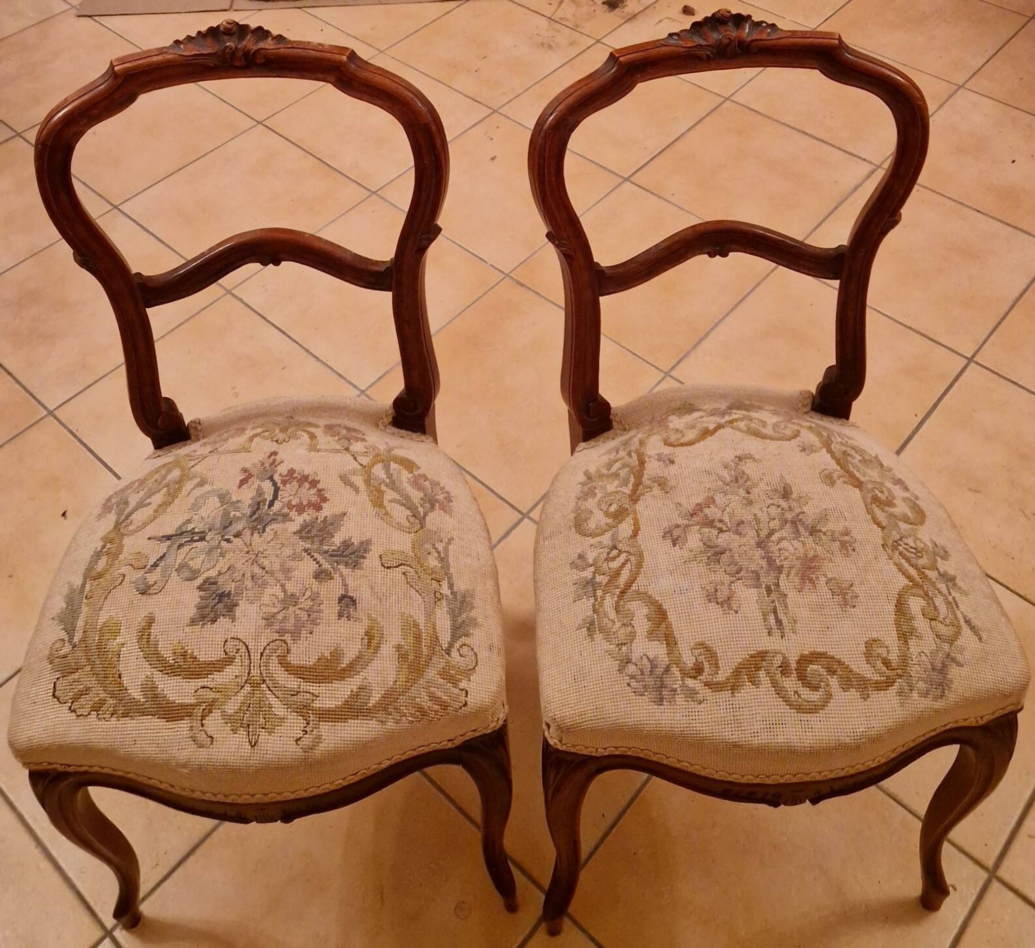 Pair of Louis XV chairs – carved wood & antique upholstery – late 19th century