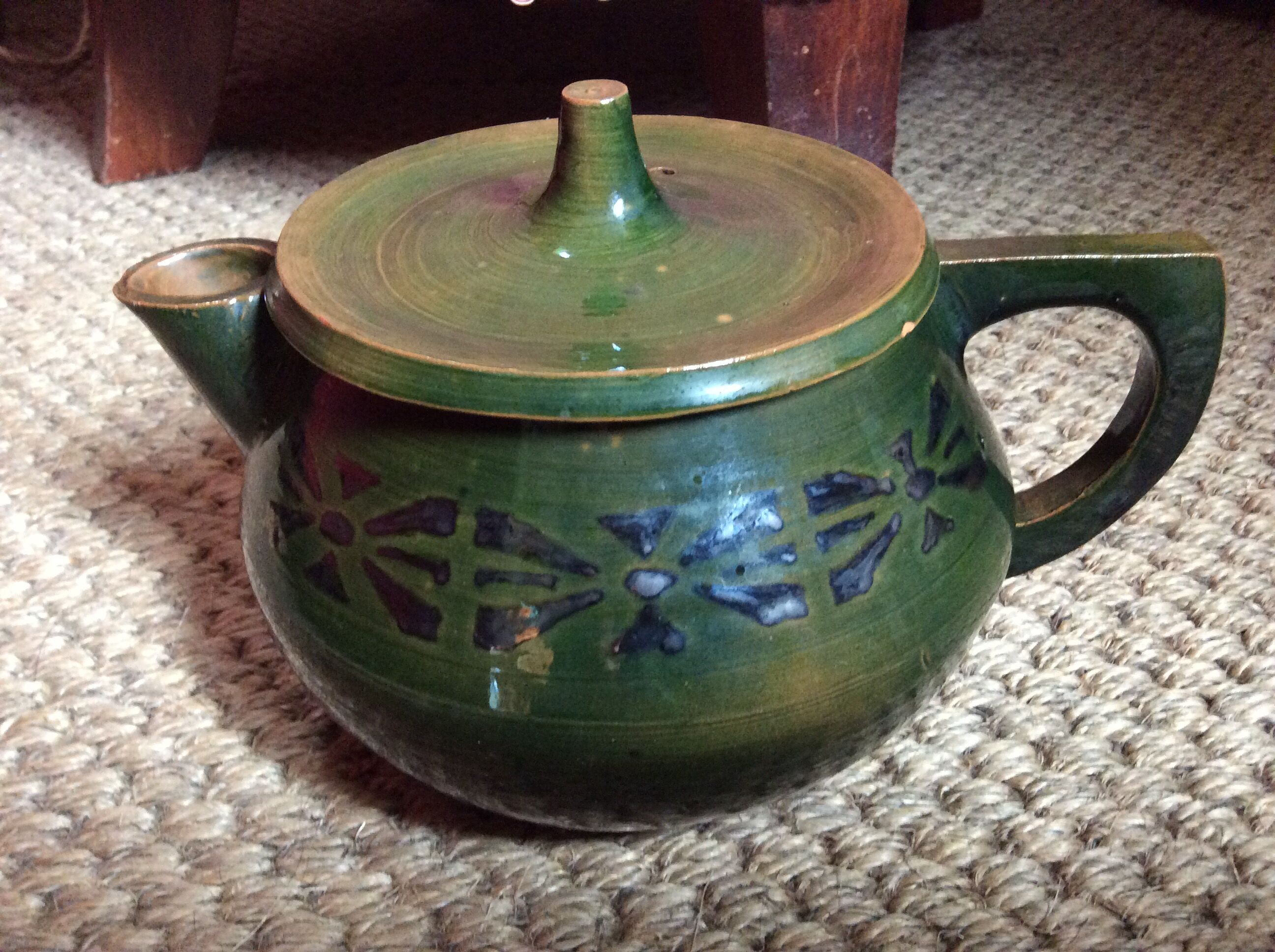 Glazed terracotta teapot