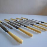 11 antique 19th-century table knives with ivory-colored monogram handles