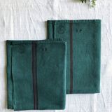 Old linen and cotton tea towel tinted in fir green