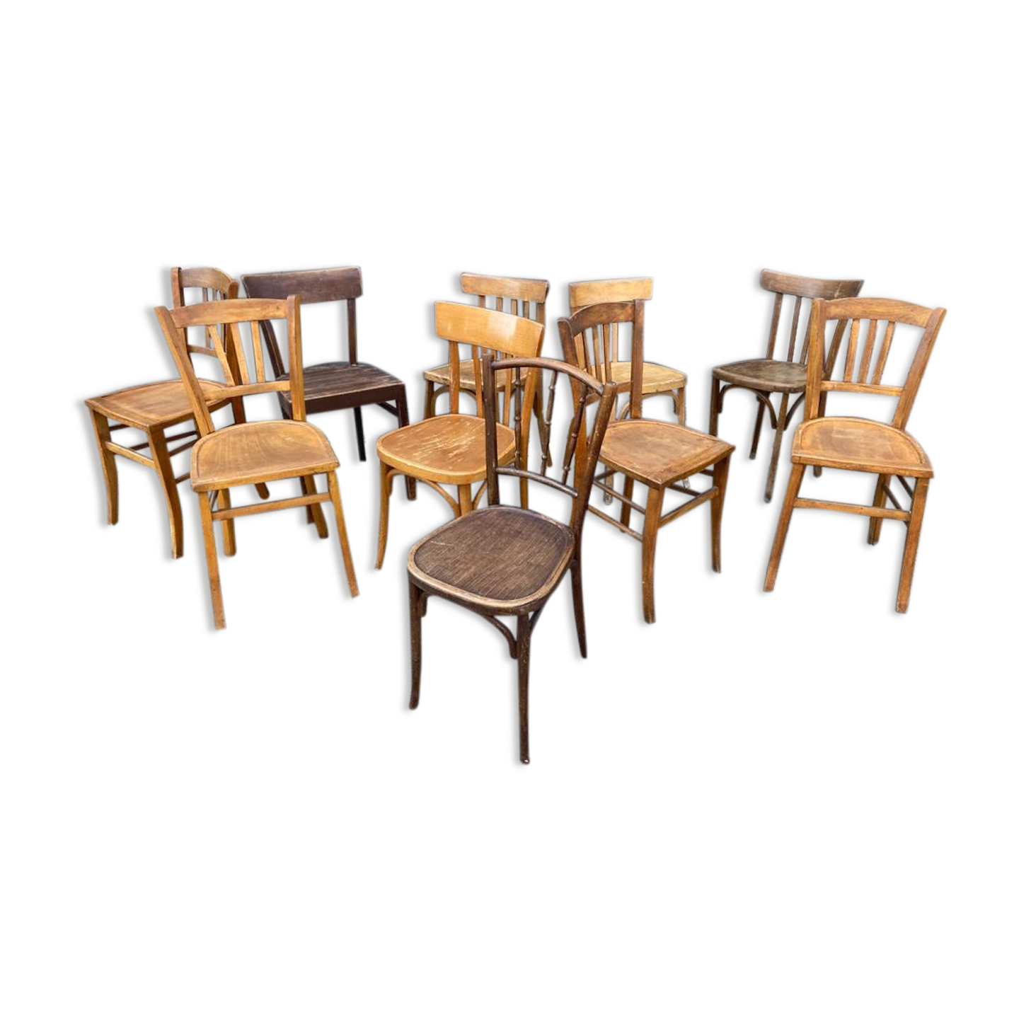 Set of 10 mismatched curved wood bistro chairs from the 1950s-60s