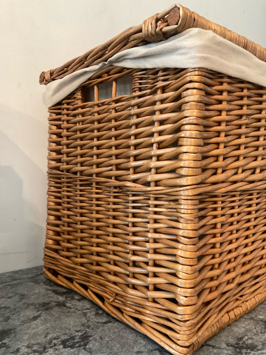 Woven wicker vintage suitcase