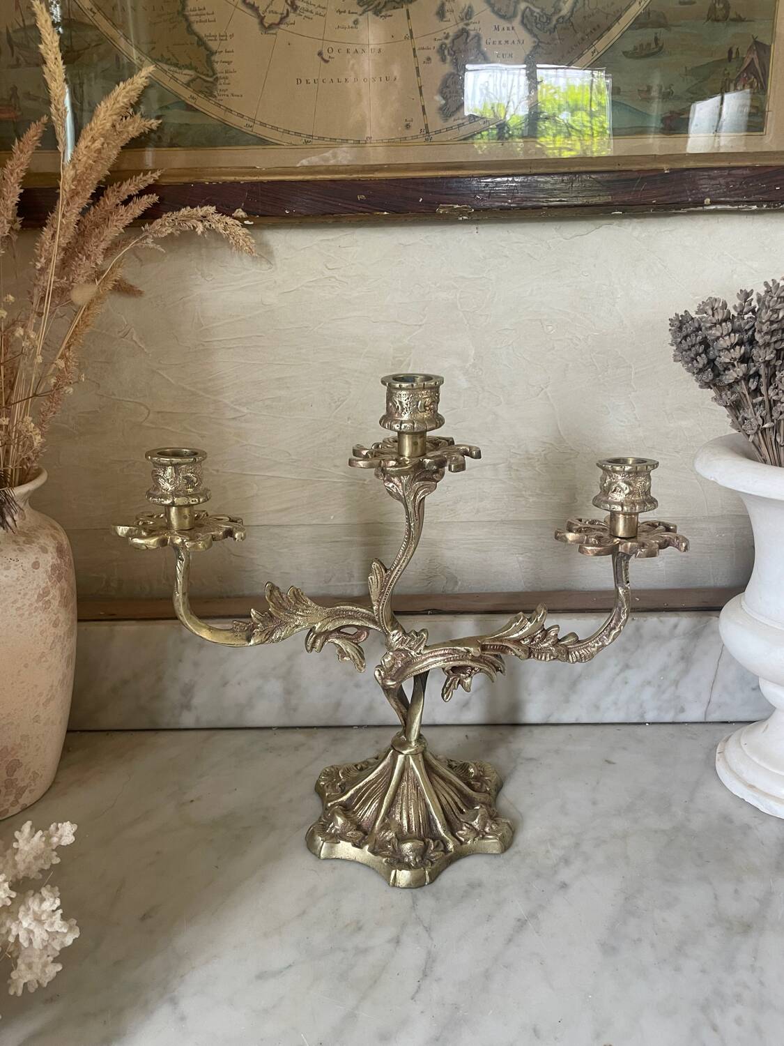 Old gilded bronze candlestick