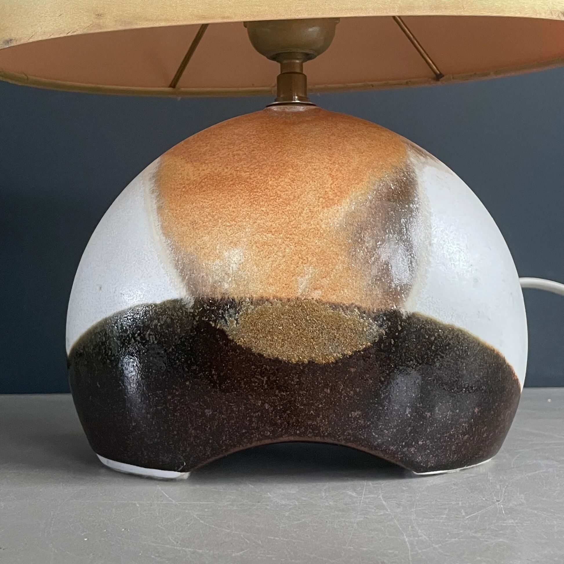 Ceramic floor lamp with a silk shade, signed.