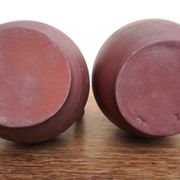 pair of terracotta bottles or carafes