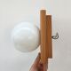 Modernist wall lamp in pine and opaline