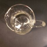 Chiseled glass pitcher