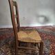 Chaise basse paillée
