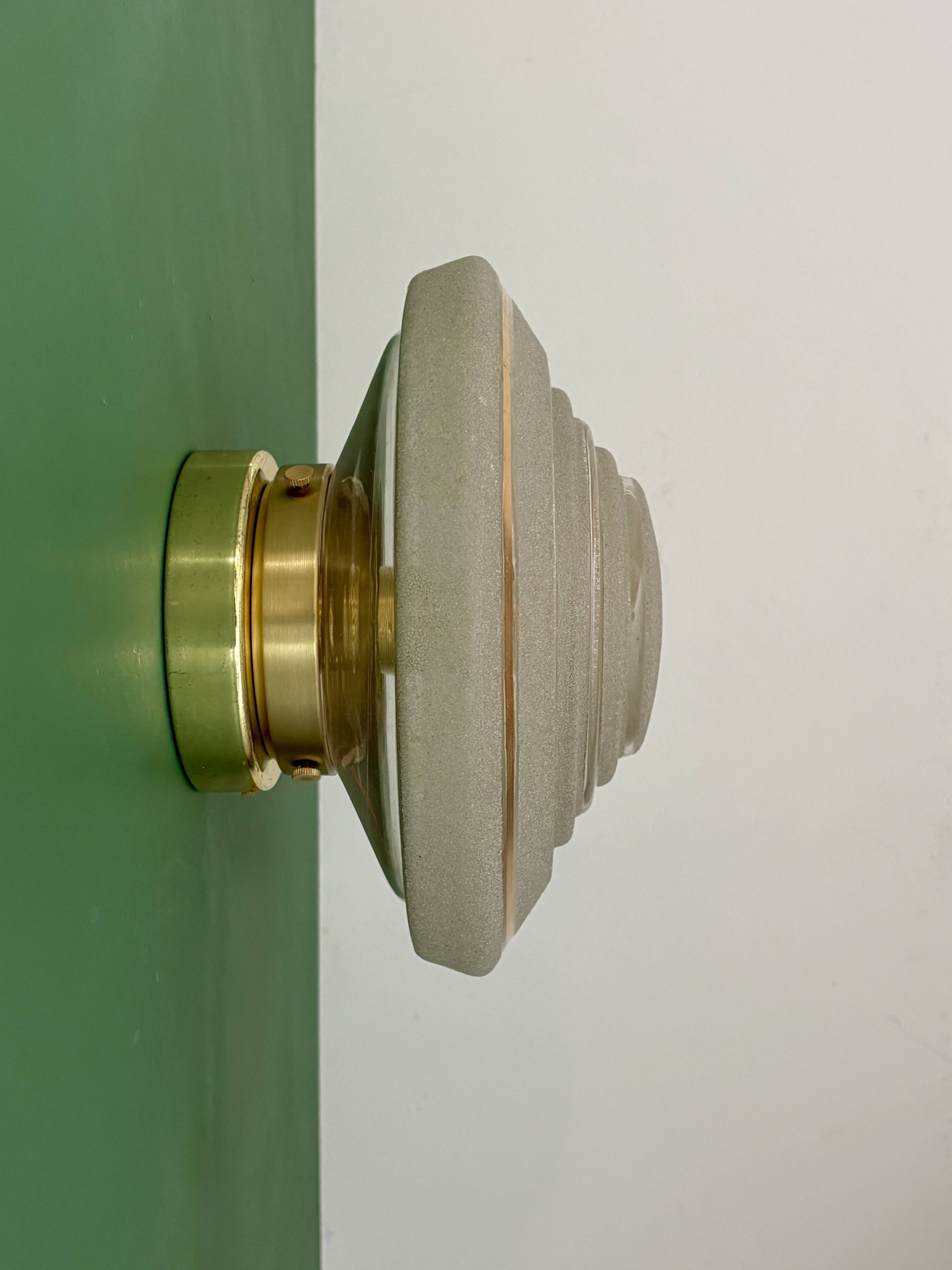 Old glass globe wall/ceiling light in frosted white and gold.