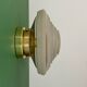 Old glass globe wall/ceiling light in frosted white and gold.