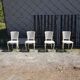 White chairs made of wood and rattan