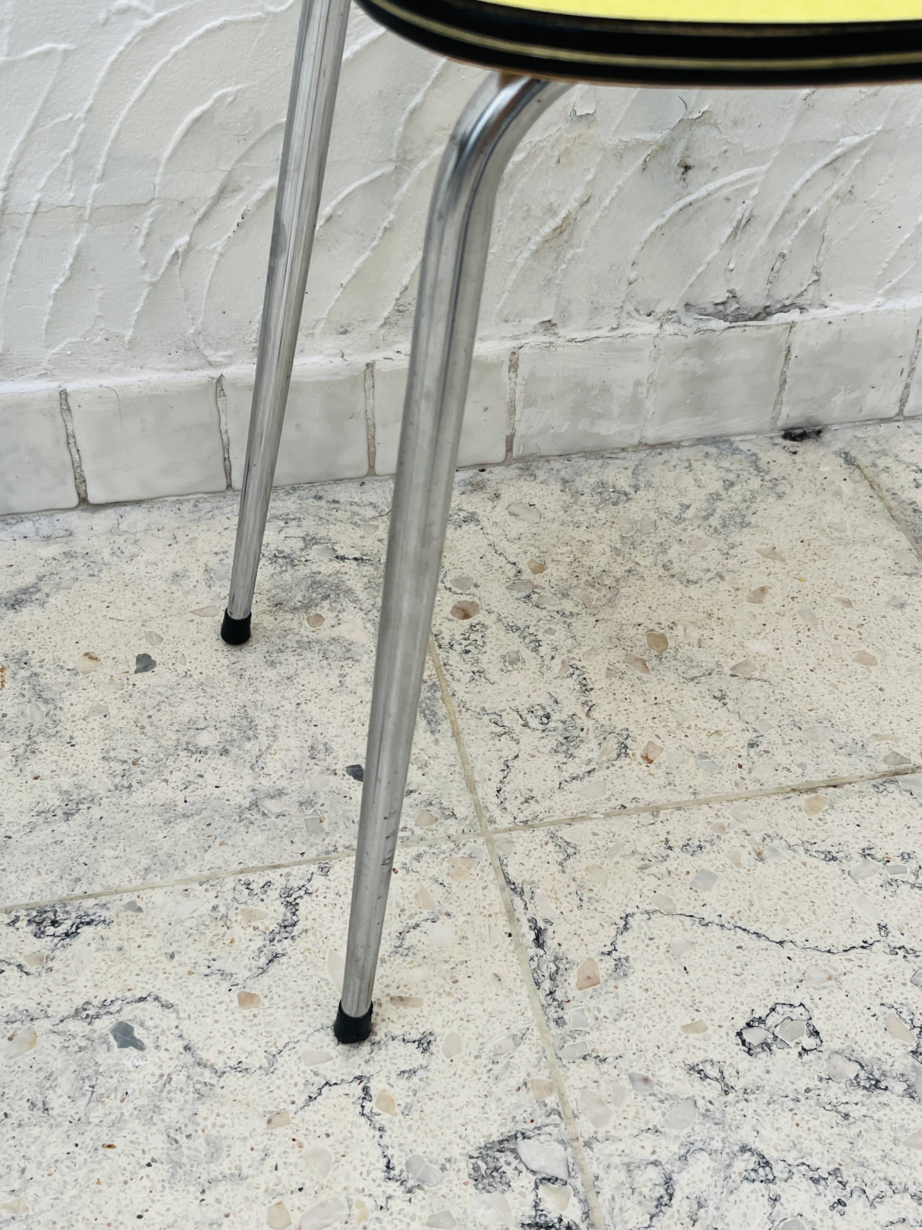 Pair of vintage yellow chrome Formica kitchen chairs.