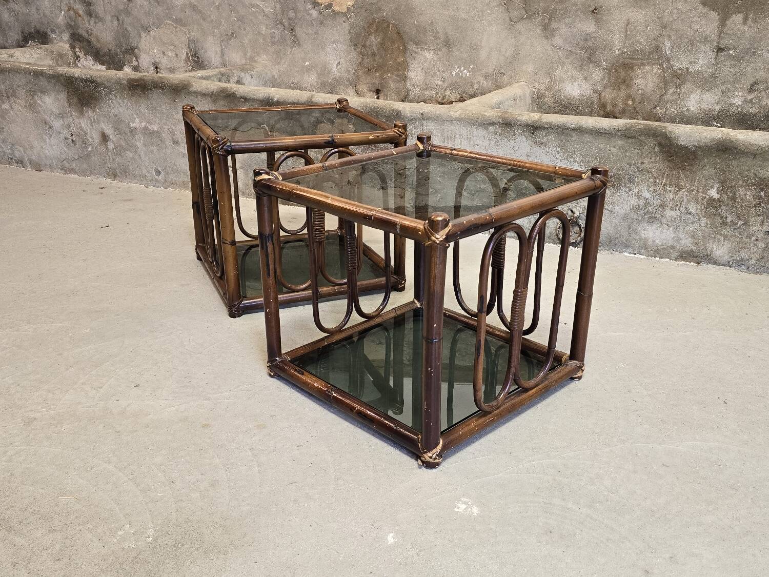 Two rattan and smoked glass tables, 1970