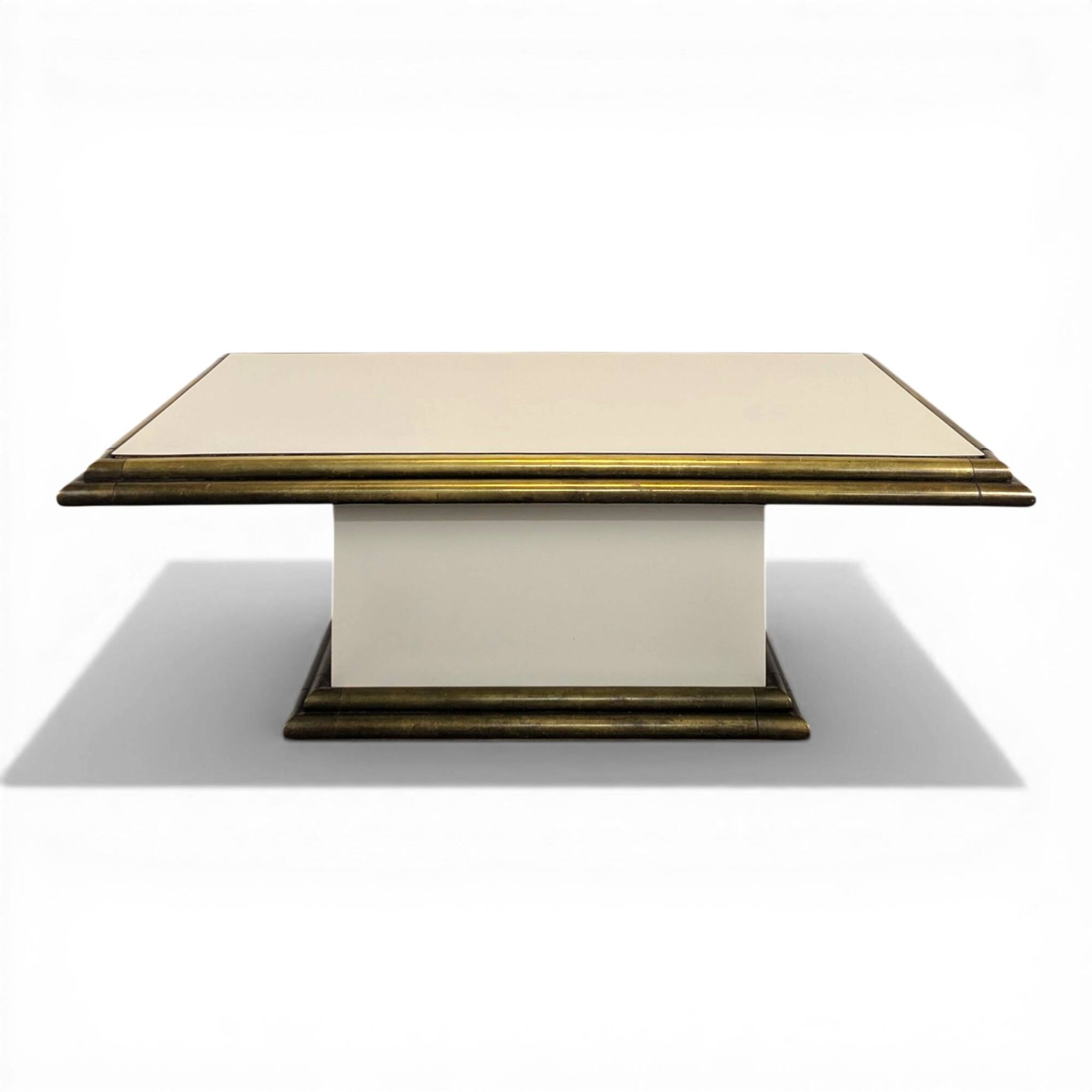 Table basse des années 80 en tubes de laitons et stratifié