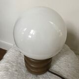 Vintage globe opaline lamp on raw wooden base