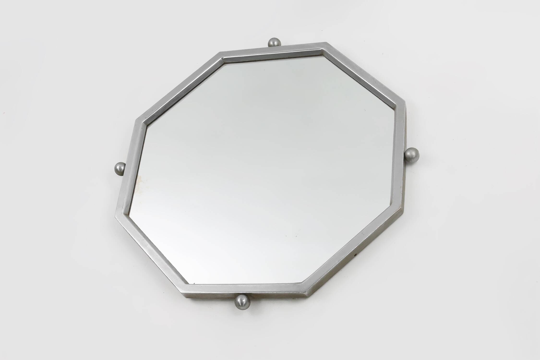 Art Deco octangular mirror in nickeled copper, France ca. 1920