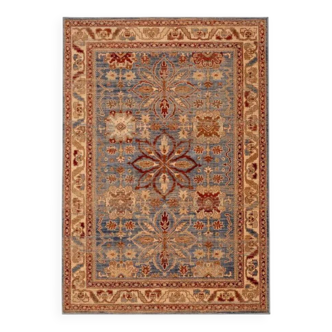 Beige, blue, red oriental rug.