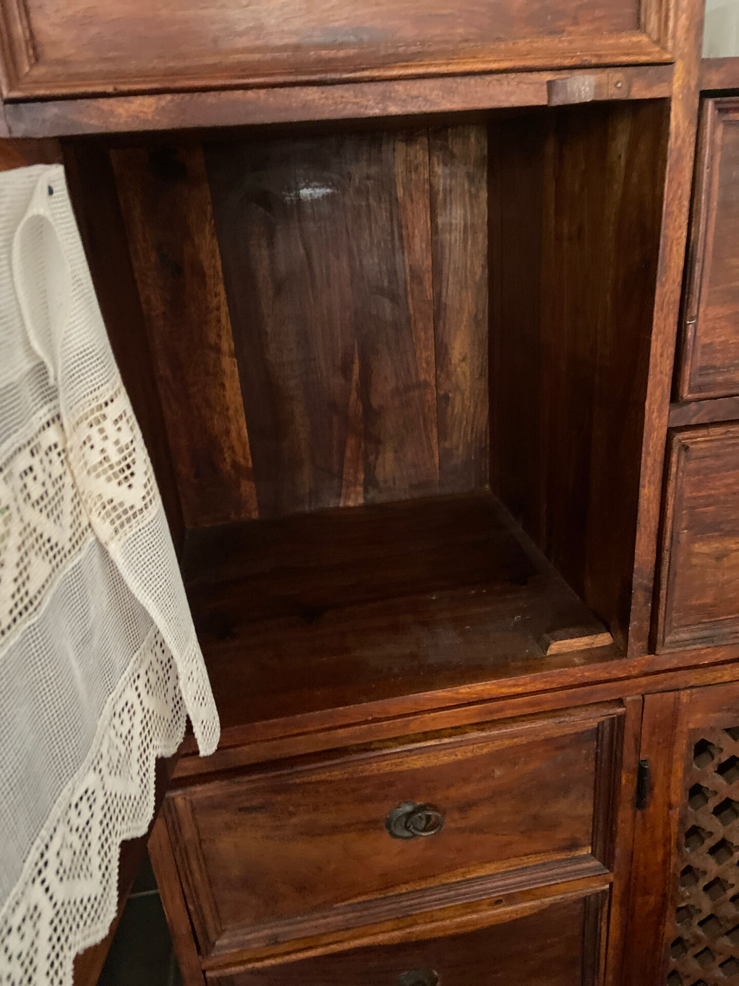 Indonesian staircase furniture in rosewood and wrought iron.