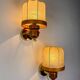 Pair of Italian articulated "Cocoon" wall lights, resin and pine, 1970s