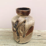 Ancient sided jug in flamed sandstone