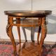 Display table in Louis XV style made of rosewood and violet wood.