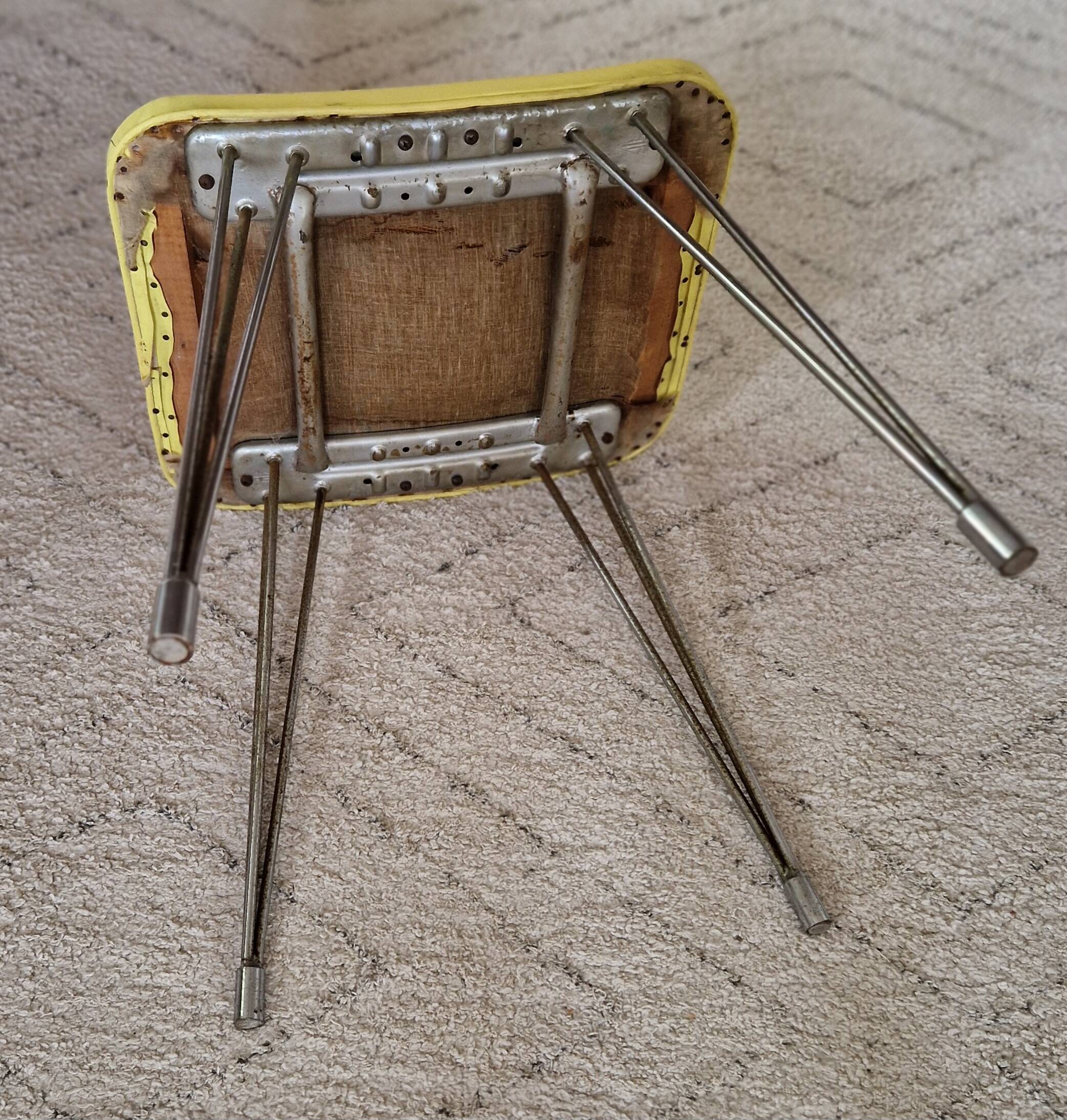 Vintage yellow leatherette stool from the 1950s