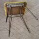 Vintage yellow leatherette stool from the 1950s