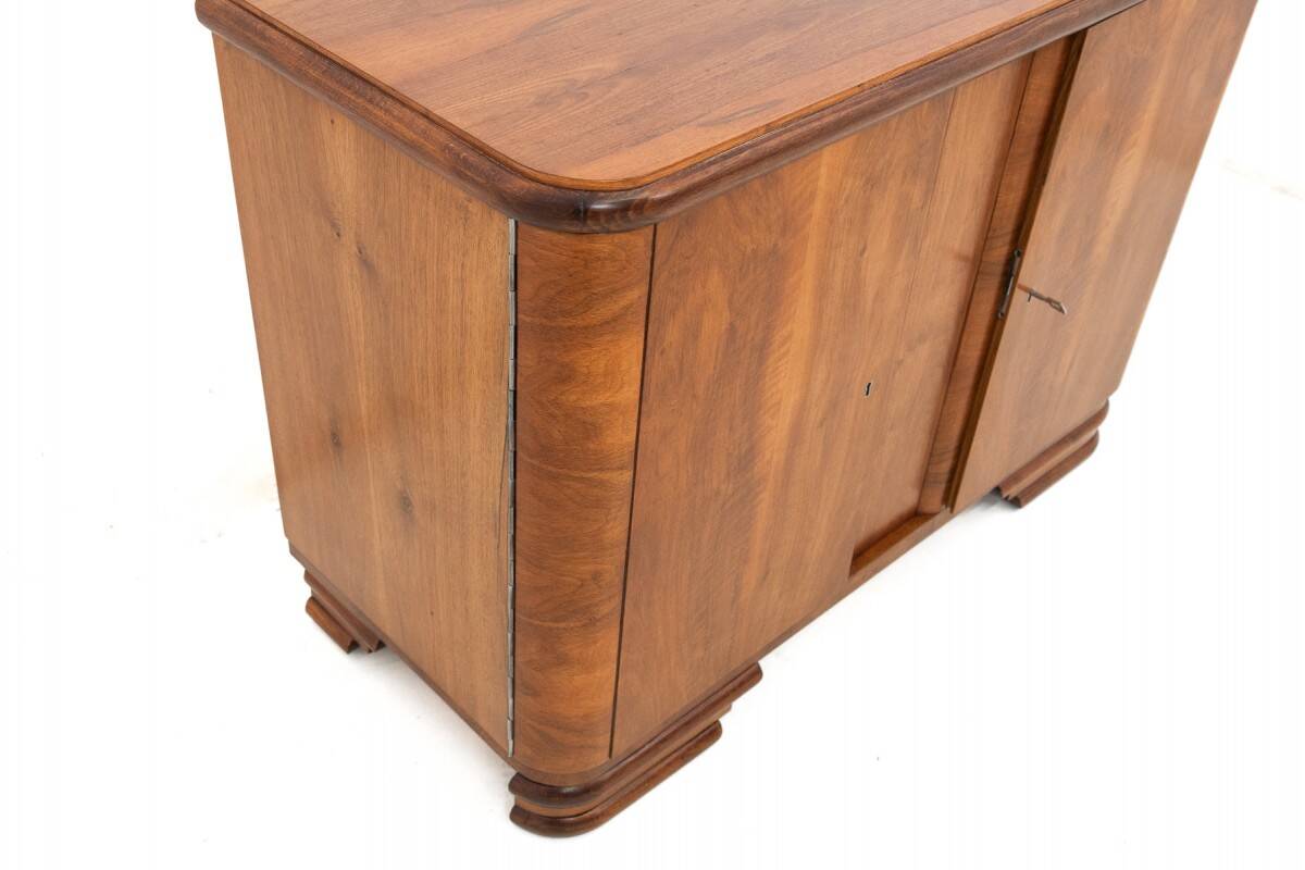 Art Deco style walnut chest of drawers, Poland, 1950s.
