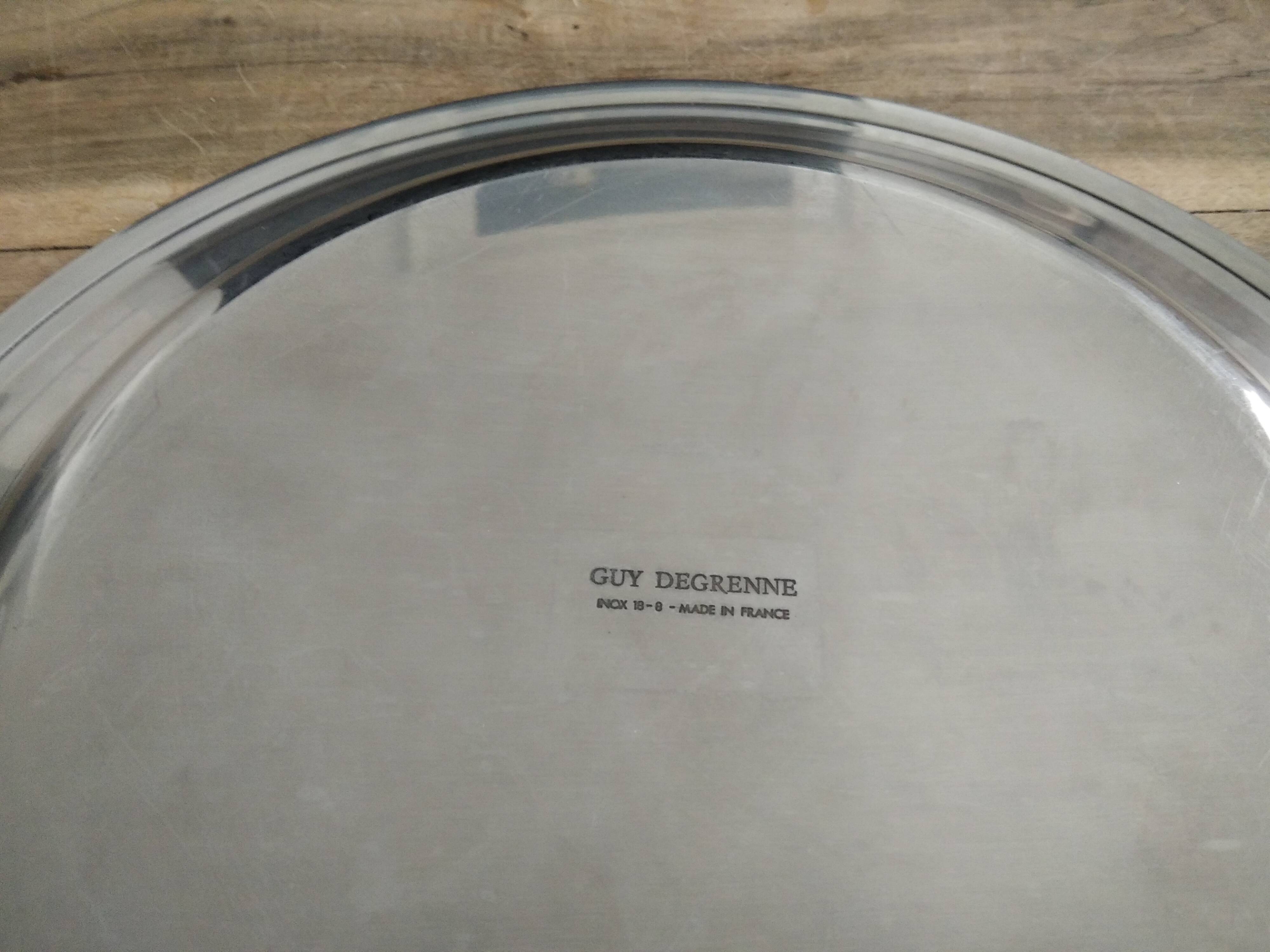 Guy degrenne's round flat Manoir collection