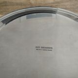 Guy degrenne's round flat Manoir collection