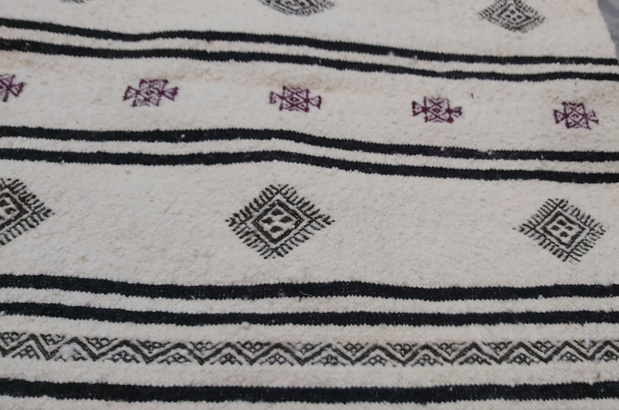 Black and purple white carpet woven by hand in pure wool