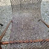 Pair of perforated metal armchairs by René Malaval 1950