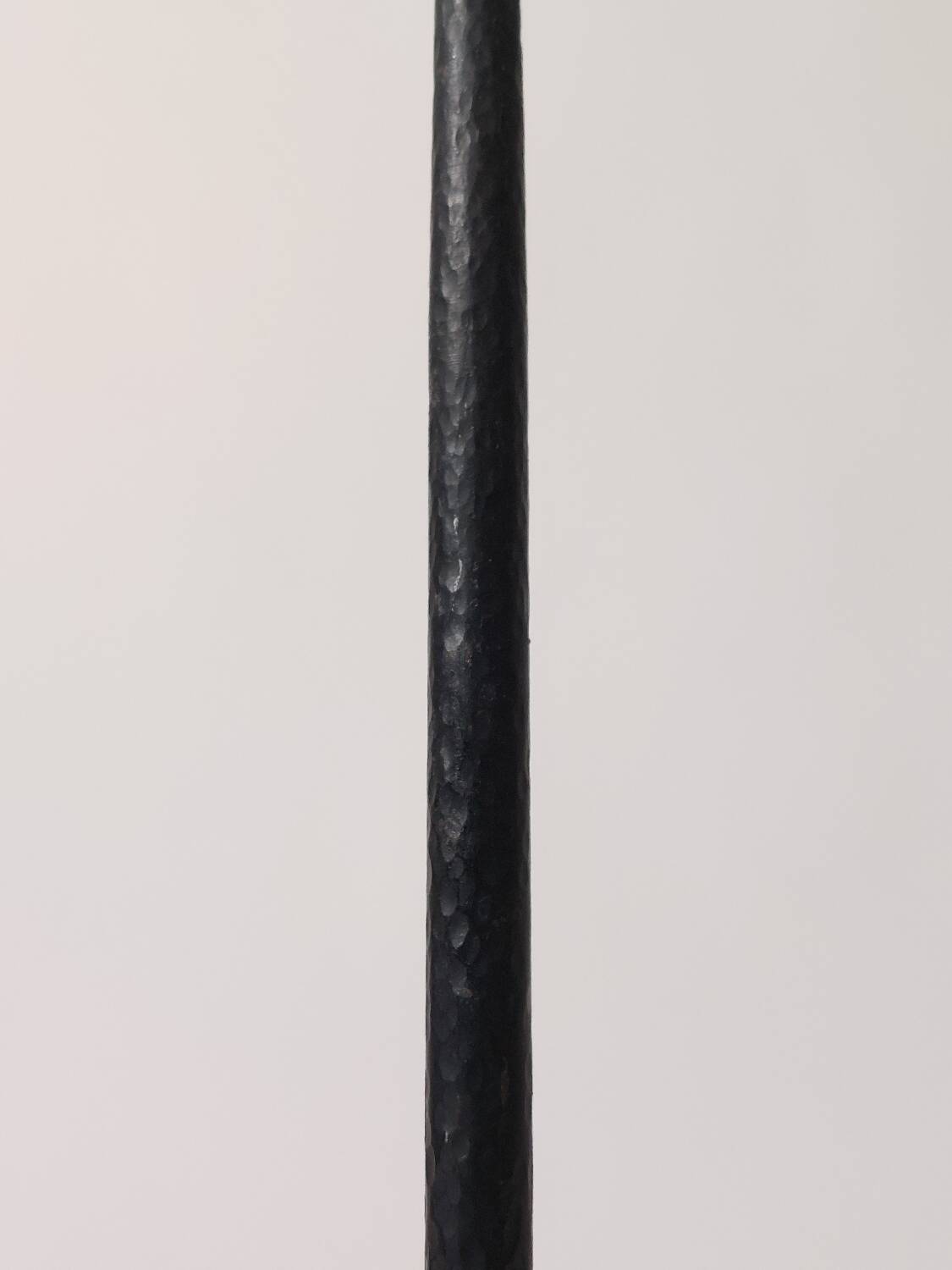 A pair of beautiful and exquisite vintage wrought iron candlesticks from the mid-century.