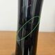 Artisanal vase in black glass with copper and blue inclusions.