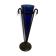Cobalt blue vase on a metal structure.