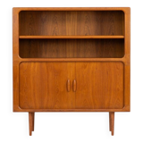 Bibliothèque en teck de Svend Dyrlund avec portes à tambour (Danemark, années 1960).