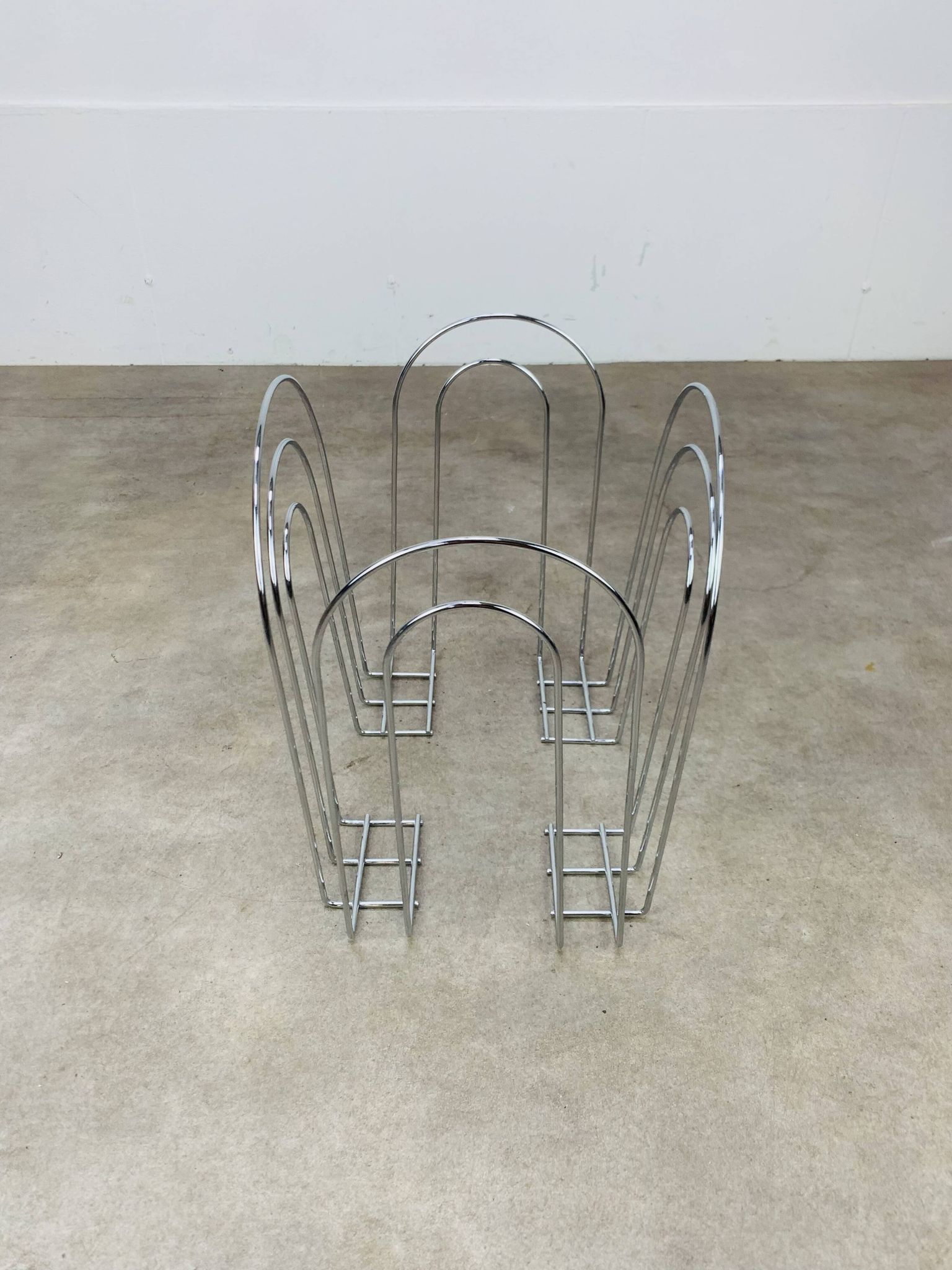 Postmodern chrome metal magazine rack from the 80s