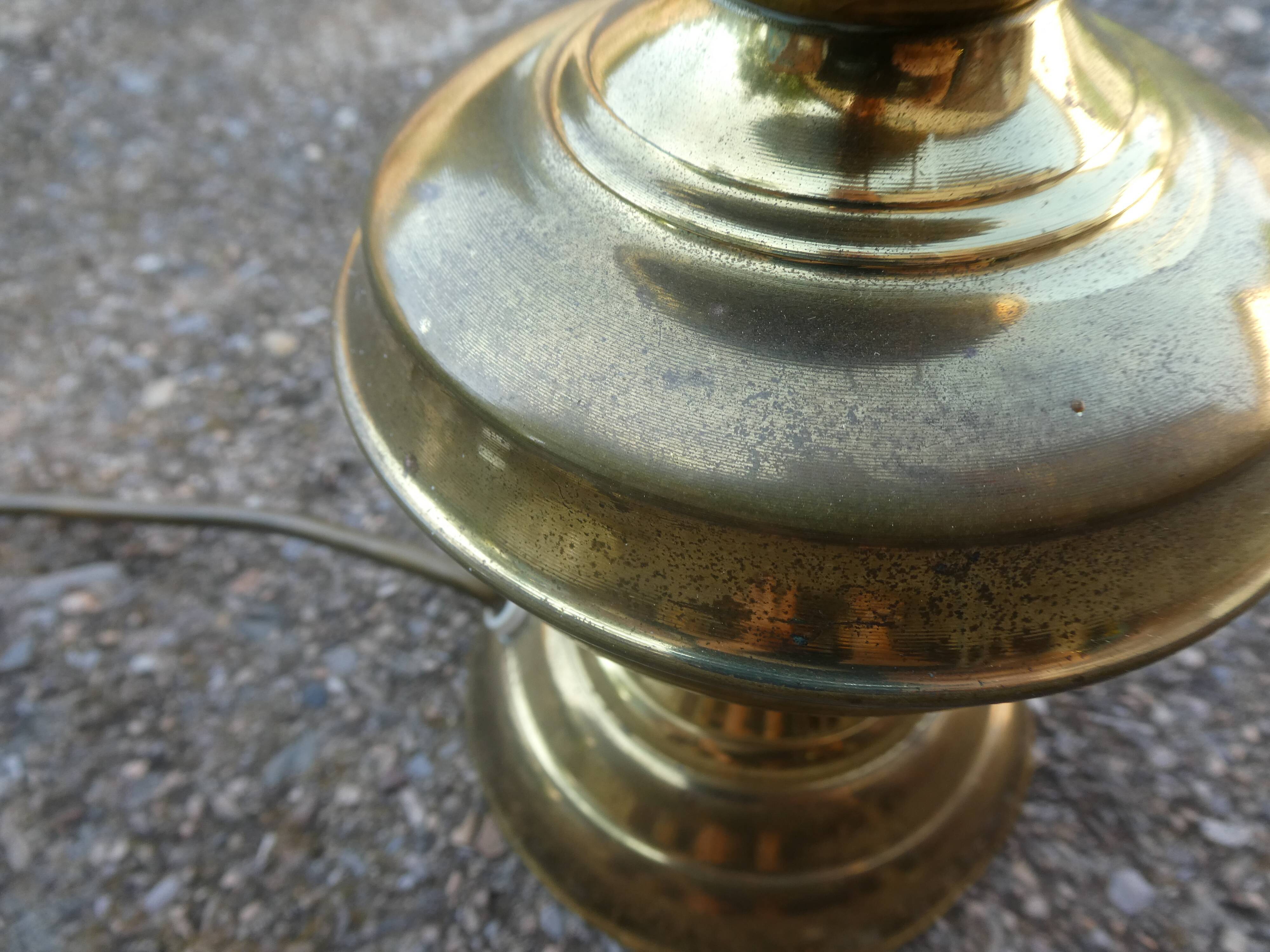 Vintage table lamp with chiseled glass globe.