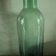 Bouteille, vase en verre vert